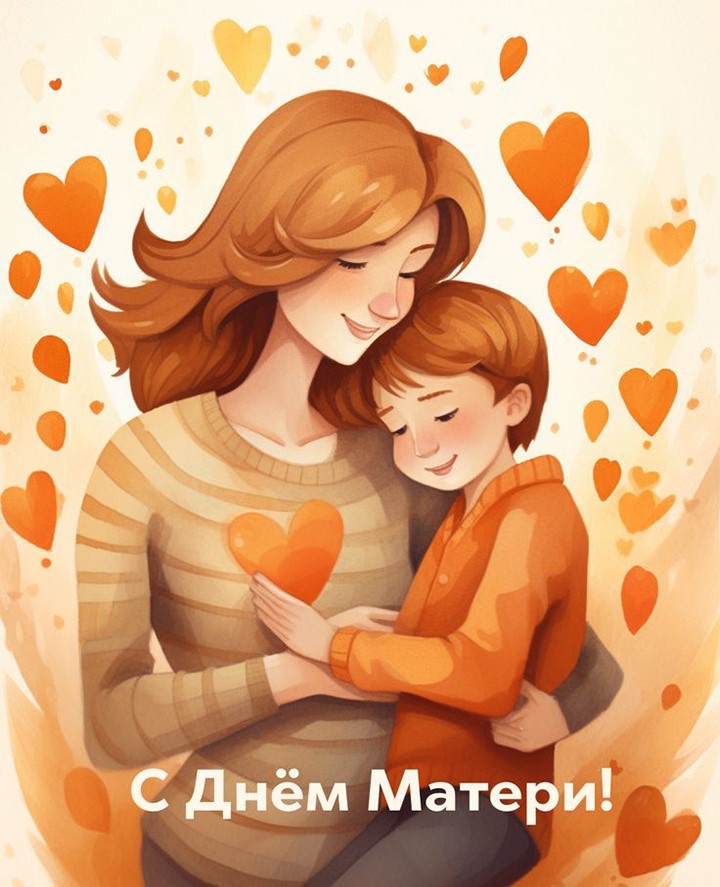 Рыжая женщина с мальчиком на руках